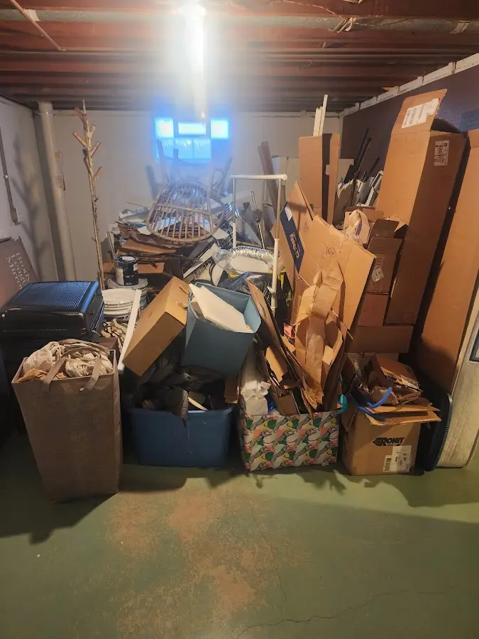 Roll-off dumpster container at job site for Concrete Dumpster Rental in Florissant